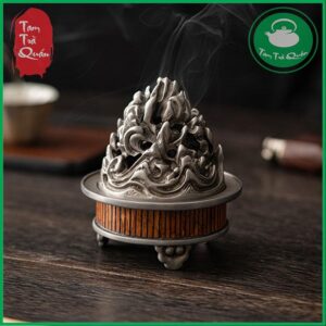 Alternative view of Lư đốt trầm hương bằng thiếc đúc vành trúc tím dáng núi non